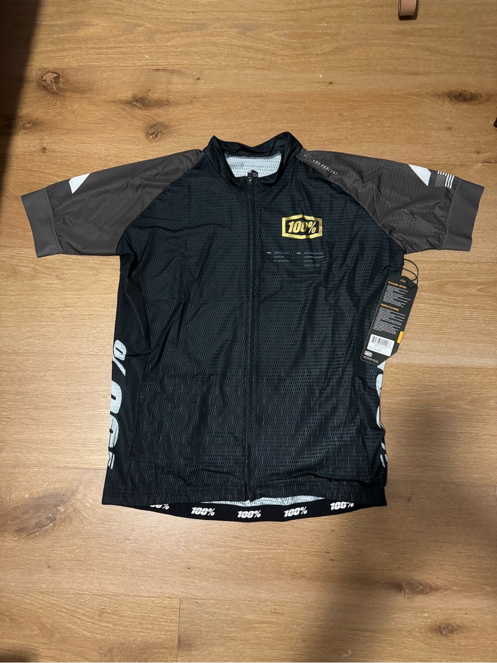 100% Pure Black and Gray Cycling Jersey with Yellow Logo